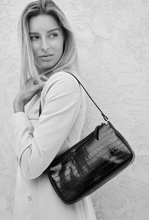 Baguette shoulder bag in black by Joanna Maxham